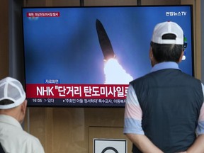 A TV screen shows a file image of North Korea's missile launch during a news program at the Seoul Railway Station in Seoul, South Korea, Friday, May 17, 2024. North Korea fired a ballistic missile off its east coast on Friday, South Korea's military said, a day after South Korea and the U.S. flew powerful fighter jets for a joint drill that the North views as a major security threat.