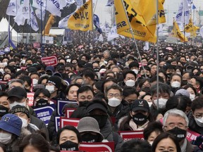 FILE - Doctors stage a rally against the government's medical policy in Seoul, South Korea, on March 3, 2024. A South Korean court ruled in favor of the government's plan to drastically boost medical school admissions on Thursday, May 16, 2024, media reports said.