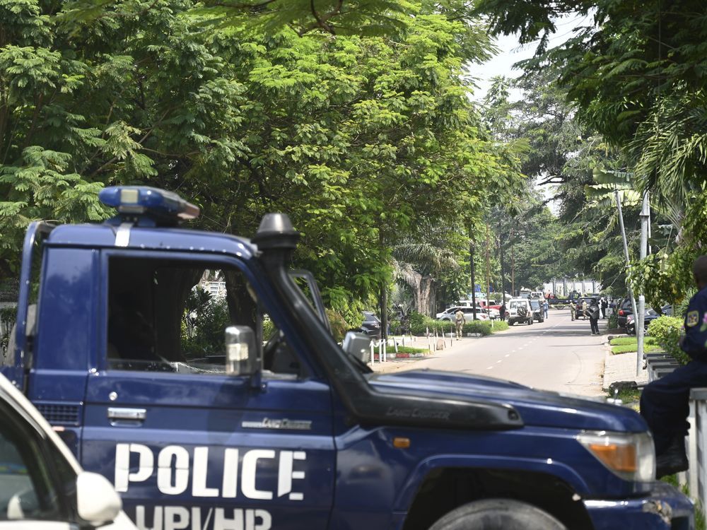 NextImg:Congo names third American in a foiled coup plot as mourners gather in Utah to remember plot leader