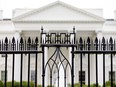 The White House is visible through the fence at the North Lawn in Washington, on June 16, 2016.