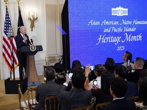 FILE - President Joe Biden speaks before a screening of the series "American Born Chinese" in the East Room of the White House in Washington, in celebration of Asian American, Native Hawaiian, and Pacific Islander Heritage Month, May 8, 2023. It has been almost 50 years since the U.S. government established that Asian Americans, Native Hawaiians and Pacific Islanders and their accomplishments should be recognized annually across the nation.