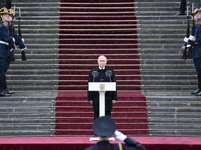 Russian President Vladimir Putin speaks to honour guards of the Presidential regiment following his inauguration ceremony at the Kremlin in Moscow, Russia, Tuesday, May 7, 2024.