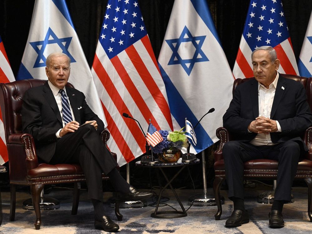 NextImg:Michael Higgins: Biden pressures Israel to lose the war