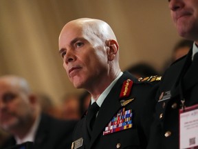 Gen. Wayne Eyre, listens as Defence Minister Bill Blair speaks during the Ottawa Conference on Security and Defence in Ottawa on Thursday, March 7, 2024.