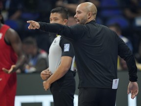 Canada coach Jordi Fernandez gestures during the Basketball World Cup semifinal game against Serbia in 2023.