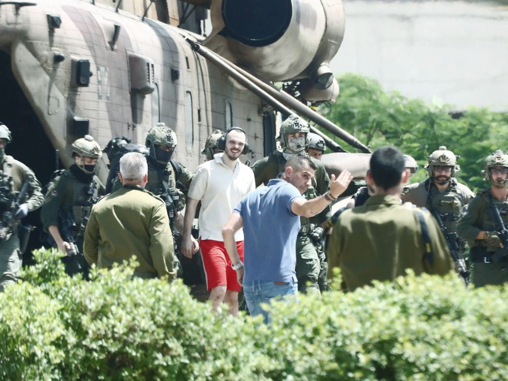 NextImg:IDF: Hamas terrorist and journalist was holding 3 hostages in home alongside family