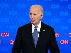 U.S. President Joe Biden looks on as he participates in the first presidential debate of the 2024 elections with former US President and Republican presidential candidate Donald Trump at CNN's studios in Atlanta, Georgia, on June 27, 2024.