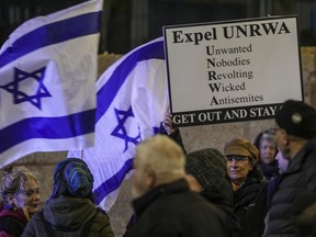 People protest against UNRWA in Jerusalem, on Monday, Feb. 5, 2024.