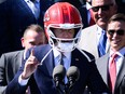 U.S. President Joe Biden wears a Kansas City Chiefs helmet during a celebration for the 2024 Super Bowl champs at the White House.
