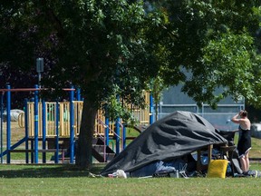 No children play on playgrounds in Strathcona Park while surrounded by tents being used by the growing homeless population in Vancouver, B.C. on Tuesday, August 18, 2020.