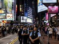 Police and crowds in Hong Kong.