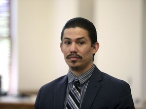 FILE - Anthony Martinez watches as the jury members leave the courtroom on Thursday, May 23, 2024, in Flagstaff, Ariz., after the jury found Martinez guilty of all charges including first-degree murder in the 2020 starvation death of his 6-year-old son. A Coconino County judge sentenced Martinez, 28, on Friday, June 28, to life in prison on the murder conviction, with additional prison sentences linked to child abuse and kidnapping convictions in the abuse of the deceased child and an older sibling.