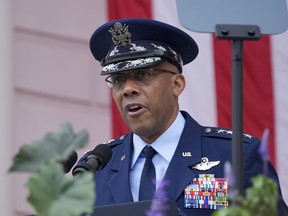 FILE - Chairman of the Joint Chiefs of Staff Air Force Gen. CQ Brown speaks at the 156th National Memorial Day Observance in the Memorial Amphitheater at Arlington National Cemetery in Arlington, Va., Monday, May 27, 2024. The forced U.S. troop withdrawals from bases in Niger and Chad and the potential to shift some troops to other nations in West Africa will be key issues as the top U.S. military officer meets with his counterparts this week at a chiefs of defense conference. Gen. CQ Brown, chairman of the Joint Chiefs of Staff, arrived in Botswana Monday, June 24, 2024, as the U.S. faces a critical inflection point in Africa.