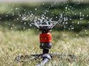 A lawn sprinkler was photographed in Calgary on Tuesday, August 15, 2023.