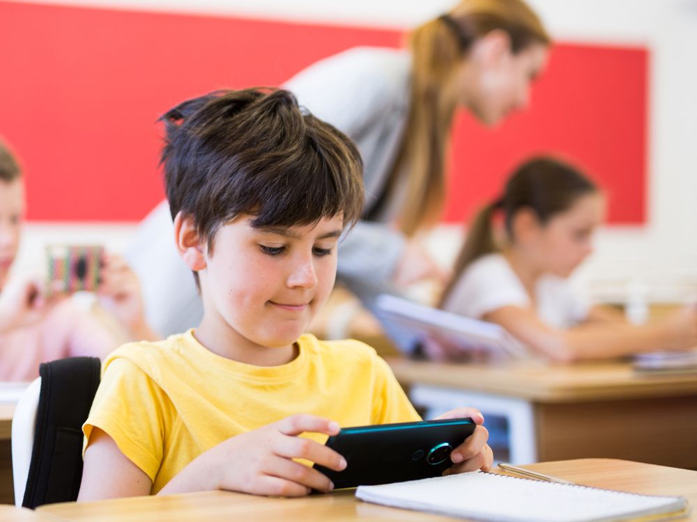 NextImg:Alberta to ban cellphones in classrooms from kindergarten to Grade 12 starting in fall