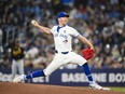 Toronto Blue Jays pitcher Chris Bassitt (40) throws the ball during first inning MLB interleague action against the Pittsburgh Pirates, in Toronto, Sunday, June 2, 2024.