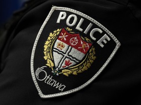 An arm patch is seen on an Ottawa Police Service officer during a news conference in Ottawa on Wednesday, Sept. 6, 2023.