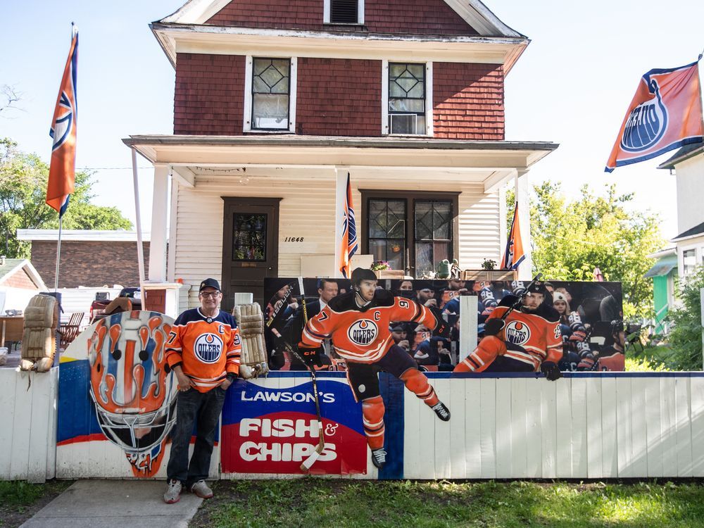 NextImg:Is that Connor McDavid? Oilers fan decorates yard with life-size player paintings