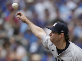 New York Yankees pitcher Gerrit Cole (45) throws during second inning American League MLB baseball action against the Toronto Blue Jays in Toronto on Sunday, June 30, 2024.