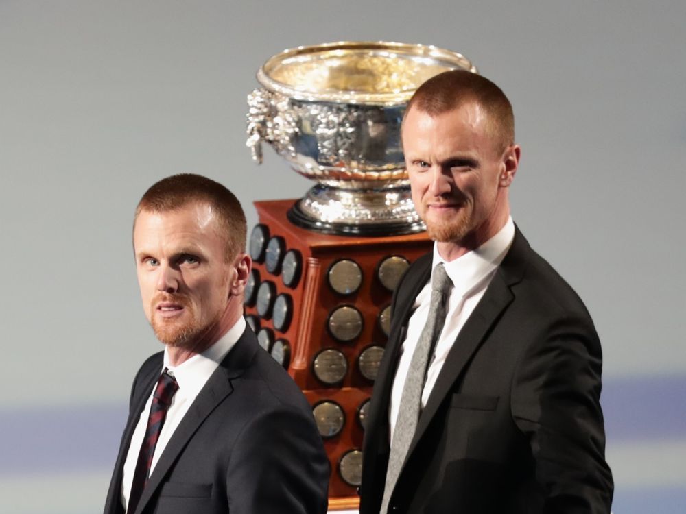 NextImg:Vancouver Canucks promote Svejkovsky to assistant coach, expand Sedins' roles