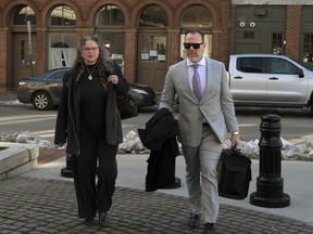Dr. Merideth Norris walks into federal court in Portland, Maine, with her attorney Tim Zerillo on Wednesday, Feb. 7, 2024. Norris, 53, of Kennebunk, was found guilty Friday, June 21, of distributing the opioids at her practice without a legitimate medical purpose and did so knowing that some patients were battling opioid addiction. A federal jury convicted Norris on 15 counts of distributing controlled substances and she faces up to 20 years on each count.