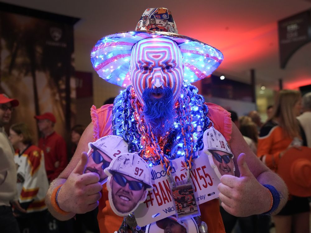 NextImg:They're not all on the same political team, but Oilers fever has brought MPs together