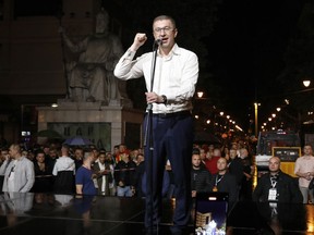 FILE - Hristijan Mickoski, the leader of the opposition conservative VMRO-DPMNE party, speaks during a celebration on the main square after their party announced victory in the presidential and parliamentary elections, in Skopje, North Macedonia, early Thursday, May 9, 2024. North Macedonia's parliament began a two-day debate leading up to a vote on the new government proposed by a center-right party that won May's national elections. Heading the government is Hristijan Mickoski, a 46-year-old engineering professor who has pledged to continue his center-left predecessors' efforts to shepherd the small Balkan NATO member into the European Union.
