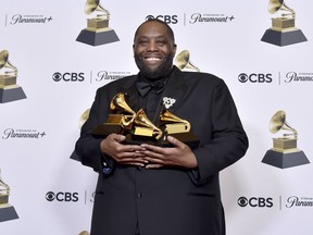 FILE - Killer Mike poses in the press room with the awards for best rap performance and best rap song for "Scientists & Engineers," and best rap album for "Michael" during the 66th annual Grammy Awards on Sunday, Feb. 4, 2024, in Los Angeles. Killer Mike is expected to avoid charges over a physical altercation that led to his arrest at the Grammys earlier this year after the rapper recently completed community service.