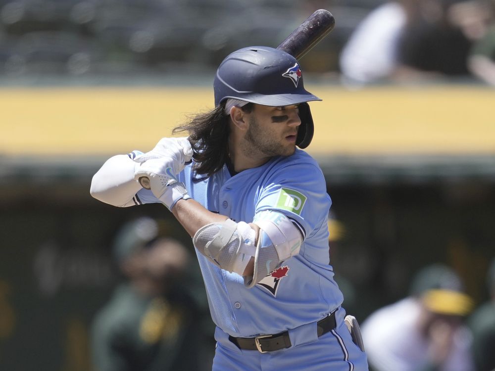 NextImg:Blue Jays place shortstop Bichette on 10-day injured list with calf strain