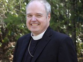 This image provided by The Episcopal Church shows Episcopal Diocese of Northwestern Pennsylvania Bishop Sean Rowe in his official 2024 church photo. (The Episcopal Church via AP)