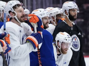 Edmonton Oilers players look on during a practice in Sunrise, Fla., on Sunday, June 23, 2024. The Oilers may not be on home ice when they try to clinch the Stanley Cup against the Florida Panthers on Monday night, but screams of support will resound across Canada.THE CANADIAN PRESS/Nathan Denette