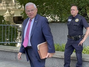 U.S. Sen. Bob Menendez, who is accused of taking bribes of cash, gold bars and a luxury car in exchange for favors performed for several New Jersey businessmen, arrives at Federal Court, in New York, Monday, June 3, 2024.