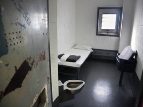 FILE - A solitary confinement cell is seen at New York City's Rikers Island jail, Jan. 28, 2016. New York's state prison system has been holding inmates in solitary confinement for too long, in violation of state law. State Supreme Court Justice Kevin Bryant said in a decision filed Thursday.