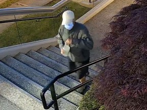 An image from video showing a man in the vicinity of a recent Vancouver synagogue arson attack is shown in a police handout. Police in Vancouver have released video showing a man who is believed to have set fire to the front entrance of a synagogue last month with the prospect that someone may recognize the suspect.