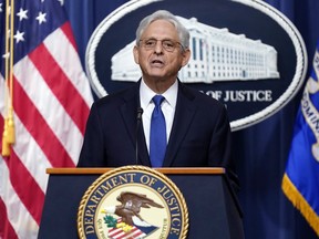 FILE - Attorney General Merrick Garland speaks at the Department of Justice, Aug. 11, 2023, in Washington. The Justice Department has charged nearly 200 people in a sweeping crackdown on health care fraud schemes nationwide with false claims topping $2.7 billion. Garland announced the charges Thursday, June 27, 2024, against doctors, nurse practitioners and others across the U.S. accused of a variety of scams, including a $900 million scheme in Arizona targeting dying patients.