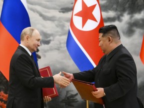 Russian President Vladimir Putin and North Korean leader Kim Jong Un
