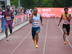 Canada’s Andre de Grasse wins ahead of USA’s Brandon Hicklin (L) and Jamaica’s Andrew Hudson during the men’s 200 metres competition of the Gyulai Istvan Memorial World Athletics Continental Tour Gold Meeting.