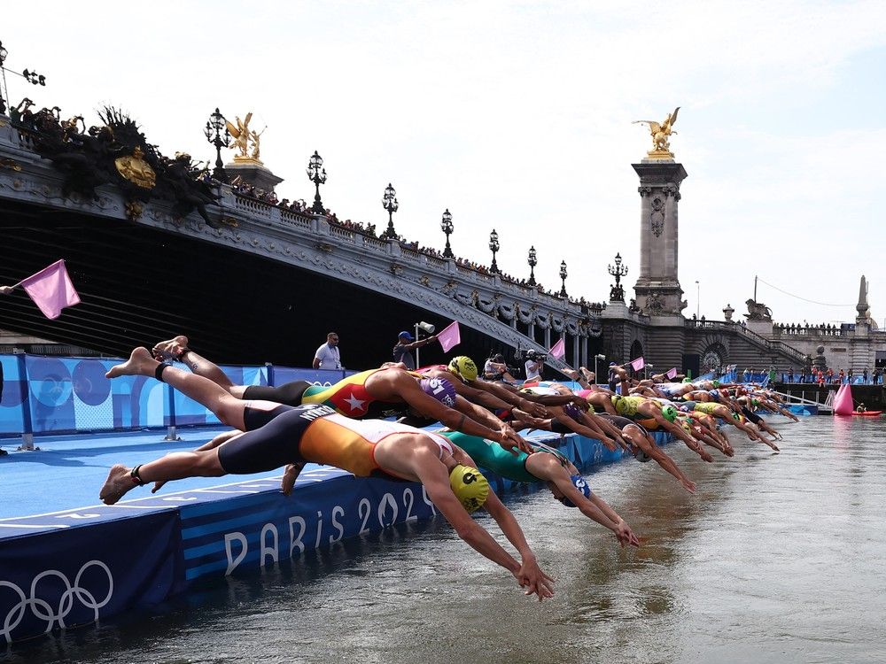 NextImg:After swimming in the Seine, some Olympians reach for the same thing you do at home: A cold pop