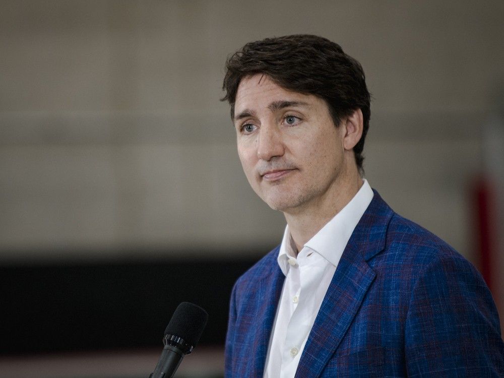 NextImg:Trudeau won't commit to caucus meeting, saying he's already heard from many Liberal MPs