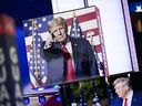 Images of Donald Trump appear on stage screens in the Fiserv Forum on the day before the Republican National Convention (RNC) on July 14, 2024, in Milwaukee, Wisconsin. The RNC will be held in Milwaukee from July 15-18. (Photo by Leon Neal/Getty Images)
