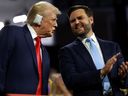 Politics tamfitronics Republican presidential candidate, former U.S. President Donald Trump (L) and Republican Vice Presidential candidate, U.S. Sen. J.D. Vance (R-OH) appear on the first day of the Republican National Convention at the Fiserv Forum on July 15, 2024 in Milwaukee, Wisconsin. (Photo by Joe Raedle/Getty Images)