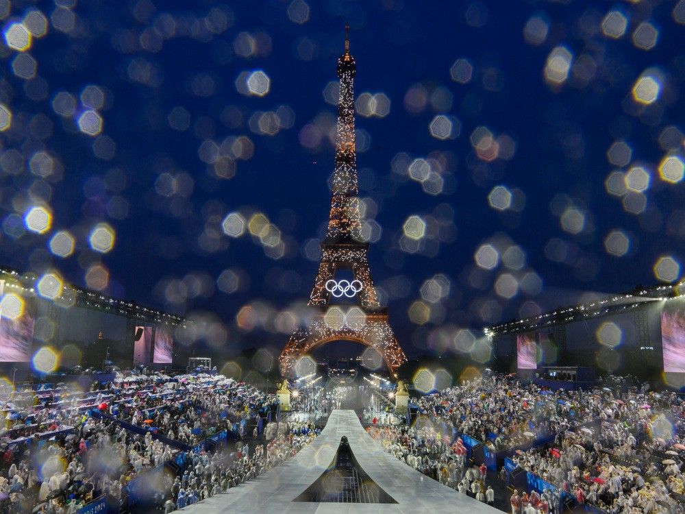NextImg:Paris wanted the Opening Ceremonies to sparkle. Then came the rain
