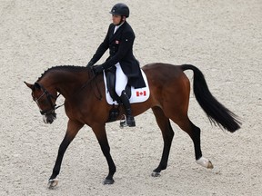 Michael Winter and horse El Mundo of Team Canada compete in the Eventing Individual Dressage leg.