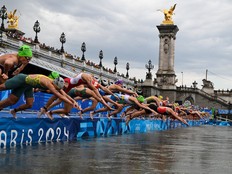 Athletes compete in the Olympic triathlon race in the Seine during the women's individual triathlon at the Paris 2024 Olympic Games.