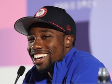 Noah Lyles of the United States speaks during a Team USA Track & Field press conference on day three of the Olympic Games