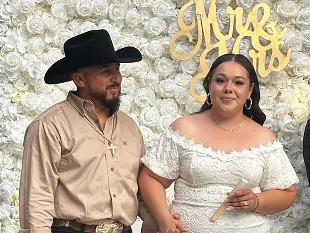 NextImg:Groom shot in the head by masked gunman during attempted robbery of backyard wedding