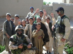 Harjit Sajjan, lower left, is seen in 2009 while serving with the Canadian military in Afghanistan.