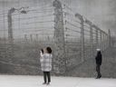Visitors at the National Holocaust Monument in Ottawa,
which