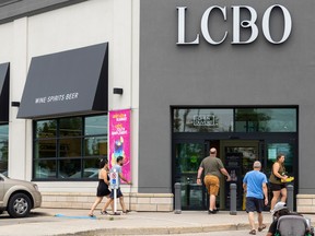 People entering an LCBO store.