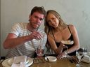 Edmonton Oilers player Connor McDavid poses with his soon-to-be wife, Lauren Kyle, in a photo posted to her Instagram stories on Monday. People online were quick to point out McDavid's apparent sunburned face.